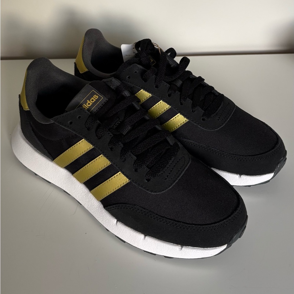 Adidas Black with Gold Stripes Sneakers